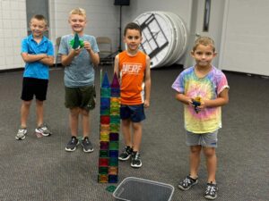 Group Of Boys Building With Magnets